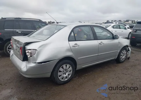 2003 Toyota Corolla Le z USA, uszkodzony, nr VIN JTDBR32E830018050